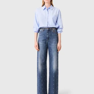 Vaquero ancho en denim con clavos